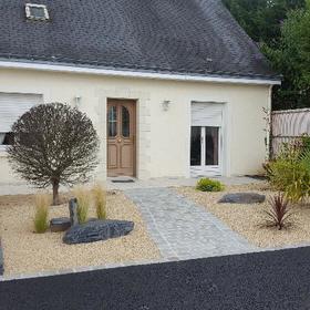 Muret, enrobé, aménagements paysagers
